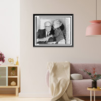 Dr. Benjamin Spock, half-length portrait, seated, listening to 31/2 year old Jamie Reed, while he waits to testify before the House Ways and Means Committee on medicare bill Classic Wall Art Prin