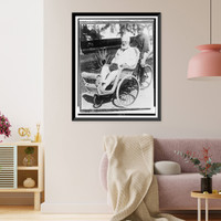 Alexander Graham Bell, seated in a wicker wheeled chair, Vintage Poster