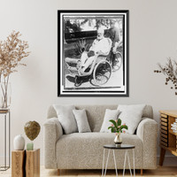 Alexander Graham Bell, seated in a wicker wheeled chair, Vintage Poster