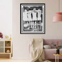 Four naked boys, viewed from behind, sitting on large blocks of ice Classic, Historic Print