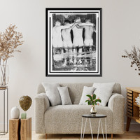 Four naked boys, viewed from behind, sitting on large blocks of ice Classic, Historic Print