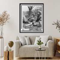 Historic Framed Print, [FSA staff members John Collier, reclining, and Jean Lee, smoking, taking a break out-of-doors],  17-7/8" x 21-7/8"