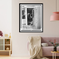Photograph shows a dead man lying inside the door of a barber shop, Antique Poster