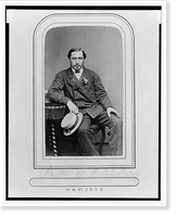 Prince Alfred, full-length portrait, seated, facing front, right arm resting on table, holding hat in right hand, cigarette in left, Historic Reproduction