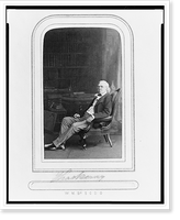 Historic Framed Print, [William Makepeace Thackeray, full-length portrait, seated, facing left],  17-7/8" x 21-7/8"