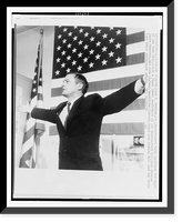 William F. Buckley, half-length portrait, standing, facing left, arms outstretched at press conference in New York City, Historic Reproduction