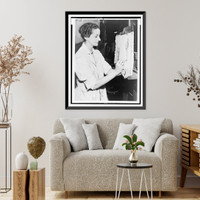 Isabel Bishop, three-quarter length portrait, seated, facing right, at easel, Historic Print