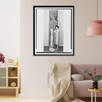 Mrs. Peggy Guggenheim, full-length portrait, standing next to and in front of pieces of sculpture, facing left Classic, Vintage Poster