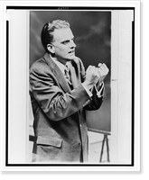 Three images of Billy Graham gesturing as he whales" in front of a near capacity crowd attending a religious rally in Madison Square Garden, New York" Classic, Historic Print