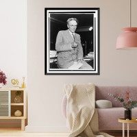 George E. Q. Johnson, three-quarter length portrait, seated on desk, facing front, Vintage Wall Art
