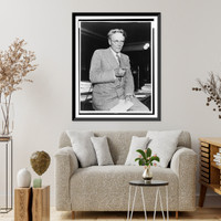 George E. Q. Johnson, three-quarter length portrait, seated on desk, facing front, Vintage Wall Art