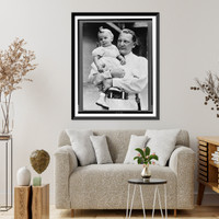 Historic Framed Print, [Hermann G&ouml;ring holding his young daughter, Edda, at Carinhall],  17-7/8" x 21-7/8"