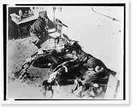 Bodies of gangsters lying on a Chicago garage floor following the St. Valentine's Day massacre - 2 Classic, Vintage Print
