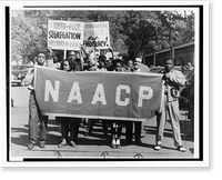 People marching with signs to protest segregation in education at the college and secondary levels.J.H. Lawson, Houston, Texas. - 3 Classic, Vintage Print