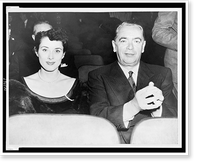 Mayor William O'Dwyer and Sloan Simpson seated in theater(?), facing front, Antique Print