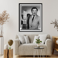 Marty Allen, half-length portrait, holding wallet with six credit cards extended in accordion fashion.World Telegram & Sun photo by Al Ravenna, Vintage Print