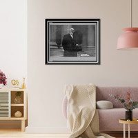 Pastor Charles Taze, half-length portrait, standing, facing slightly right, holding hat, Vintage Poster