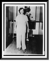 Babe Didrikson Zaharias, full-length portrait, standing, facing front, in pajamas in a Beaumont, Texas hospital following a cancer operation, Historic Print
