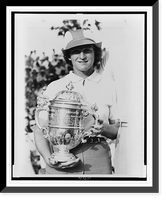 Babe Didrikson Zaharias, half-length portrait, standing, facing front, holding trophy she won in the Tam O'Shanter world" golf tournament in Chicago", Vintage Print