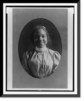 Historic Framed Print, [Young African American woman, half-length portrait, facing front, smiling],  17-7/8" x 21-7/8"