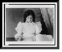 African American girl, half-length portrait, looking at open book, Antique Poster