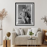 Historic Framed Print, [African American boy, three-quarter-length portrait, half-sitting on table, facing front],  17-7/8" x 21-7/8"