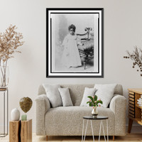 Historic Framed Print, [African American girl, full-length portrait, standing next to chair, facing front],  17-7/8" x 21-7/8"