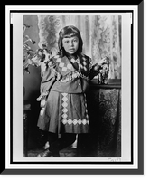 Historic Framed Print, [African American girl, full-length portrait, standing next to table, facing front],  17-7/8" x 21-7/8"