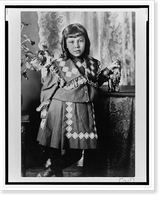 Historic Framed Print, [African American girl, full-length portrait, standing next to table, facing front],  17-7/8" x 21-7/8"