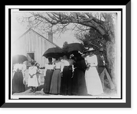African American women holding umbrellas to provide shade from the sun, with two men, and with a building (church or meeting house) in the background Classic, Antique Wall Art