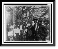 African American men and boys, three-quarter length portrait, dressed for church, trees in background, Vintage Print