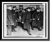 Historic Framed Print, [New York City policemen removing the body of Vincent Coll from the drugstore in which he was murdered],  17-7/8" x 21-7/8"