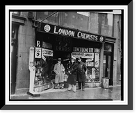 Historic Framed Print, [Two men and a New York City policeman outside the drugstore where Vincent Coll was murdered],  17-7/8" x 21-7/8"