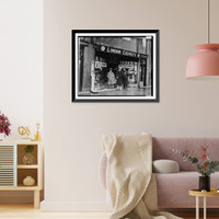 Historic Framed Print, [Two men and a New York City policeman outside the drugstore where Vincent Coll was murdered],  17-7/8" x 21-7/8"