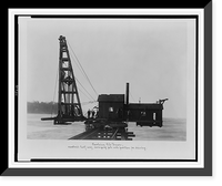 Revolving pile driver; revolved half-way, swinging pile into position for driving, Vintage Print