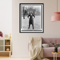 A pre-teen girl modeling a Chanel look" sweater and skirt outfit on a playground", Vintage Print