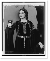 Kirsten Flagstad, three-quarter length portrait, facing left, in costume for Tristan and Isolde", holding chalice.Carlo Edwards, New York.", Historic Reproduction