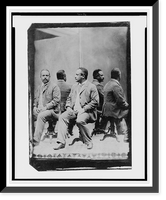 Unidentified African American man posed, full-length, seated, facing left, in front of mirrors, which reflect four mirror images of him, Antique Print