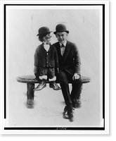Fred Allen, full-length portrait, facing front, seated with his ventriloquist's dummy Jake, Vintage Poster