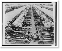 Rows of 40mm Bofors light anti-aircraft(?) guns on Mark II mountings sitting beside railroad tracks in England, in preparation for Allied liberation of Europe, Antique Print
