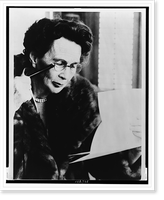 Adela Rogers St. Johns, half-length portrait, facing right, reading through a lorgnette, Vintage Poster