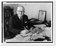 Historic Framed Print, [Norman Vincent Peale, half-length portrait, seated at desk, facing front].World Telegram & Sun photo by Roger Higgins.,  17-7/8" x 21-7/8"