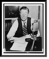 Historic Framed Print, [Frazier Hunt, head-and-shoulders portrait, seated at desk behind CBS microphone],  17-7/8" x 21-7/8"