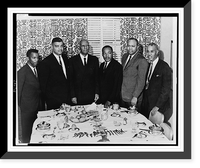 Civil rights leaders (left to right), John Lewis, Whitney Young, Jr., Dr. Martin Luther King, Jr., James Farmer, and Roy Wilkins stand behind table at meeting at Hotel Commodore, New York City Vi