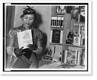 Zora Neale Hurston, half-length portrait, standing, facing front, looking at book, American Stuff, at New York Times Book Fair, Antique Wall Art