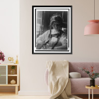 Girl with braids in white dress with bow, with hands folded, seated, Historic Print