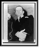 Jack Ruby, half-length portrait, handcuffed, facing front, leaving jail for mental and physical examination, Vintage Poster