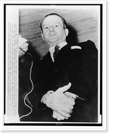Jack Ruby, half-length portrait, handcuffed, facing front, leaving jail for mental and physical examination, Vintage Poster