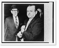 Jack Ruby, half-length portrait, handcuffed, being escorted by Dallas County Sheriff Bill Decker, to courthouse for sanity trial, Dallas, Texas, Antique Print