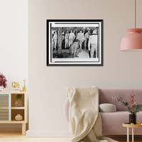 Historic Framed Print, [African American man, rising, after being knocked to the ground by mob at Central High School, Little Rock, Arkansas],  17-7/8" x 21-7/8"
